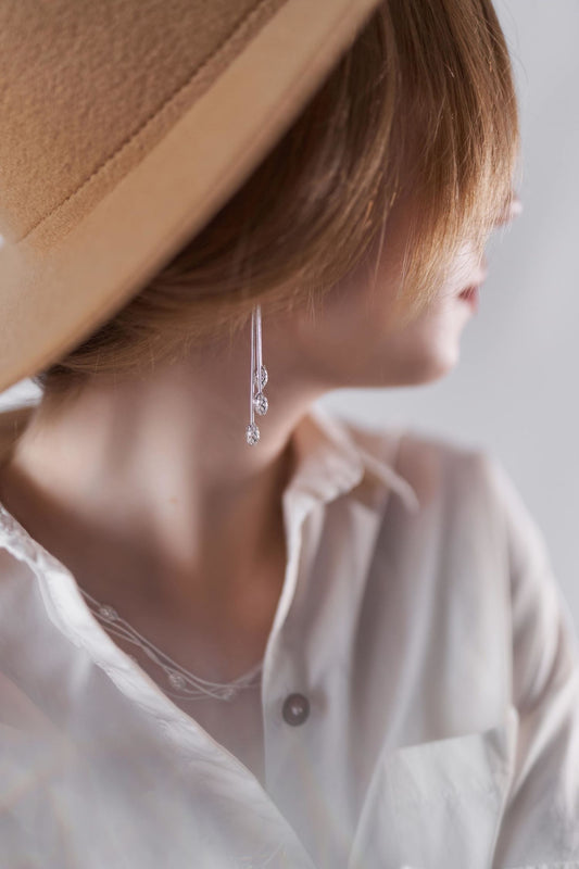 Hopeapuro, Käpy Korvakorut