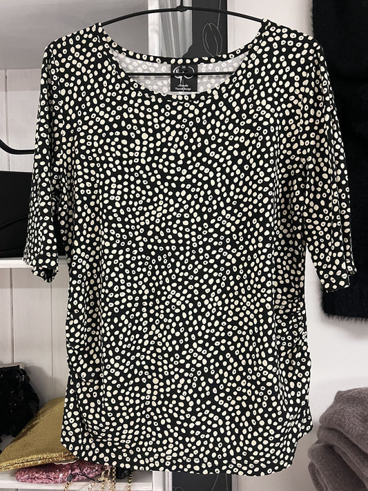 Niccolei, pilkullinen pusero