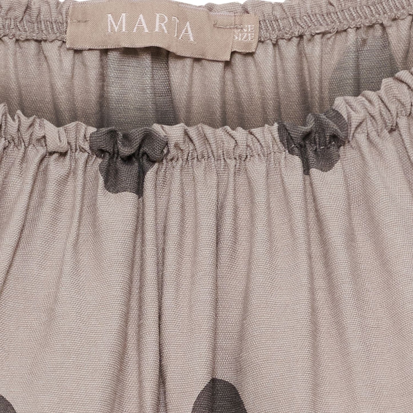 Marta du Chateau, Luciana Top